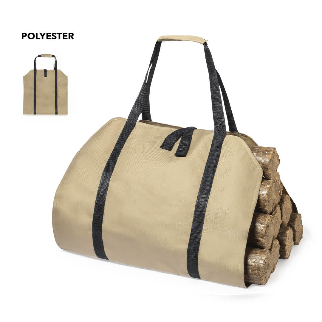 A tan log carrier bag with black straps, designed to hold firewood securely. It has a simple, functional design. Priya Log Carrier - Image 1