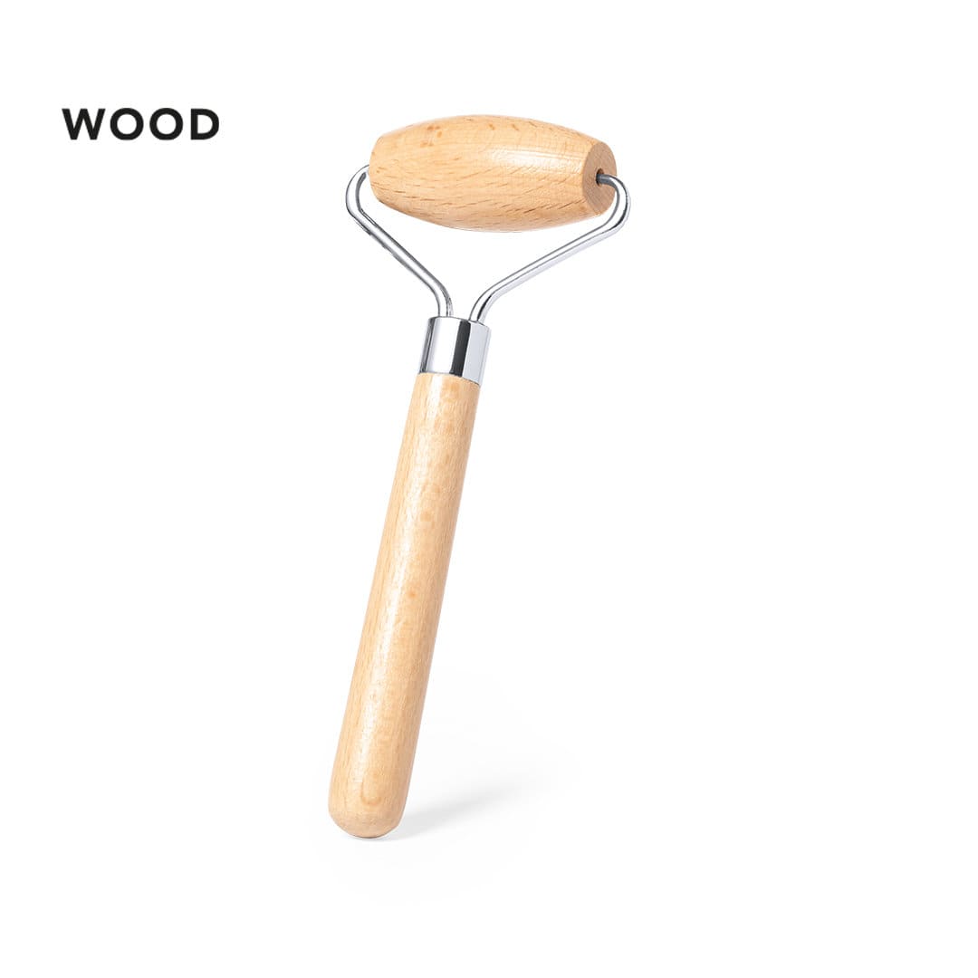 A wooden face massager with a silver metal roller, featuring a natural wood handle. Charmand Face Massager - Image 1