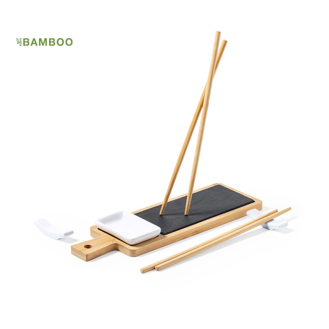 A bamboo sushi set featuring a black plate, white dipping dish, and two pairs of bamboo chopsticks. Gunkan Sushi Set - Image 1