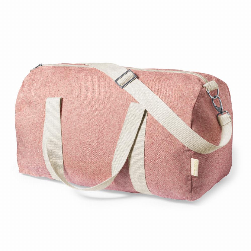A duffle bag in a muted pink shade with a light beige shoulder strap and handles. It features a zip closure. Golduck - Image 1