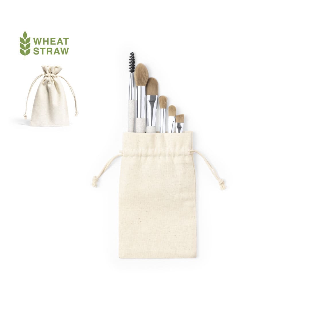 A set of eight eyeshadow applicators in a cream pouch, featuring a mix of brushes and tools for makeup application. Kurt Eyeshadow Applicator Set - Image 1