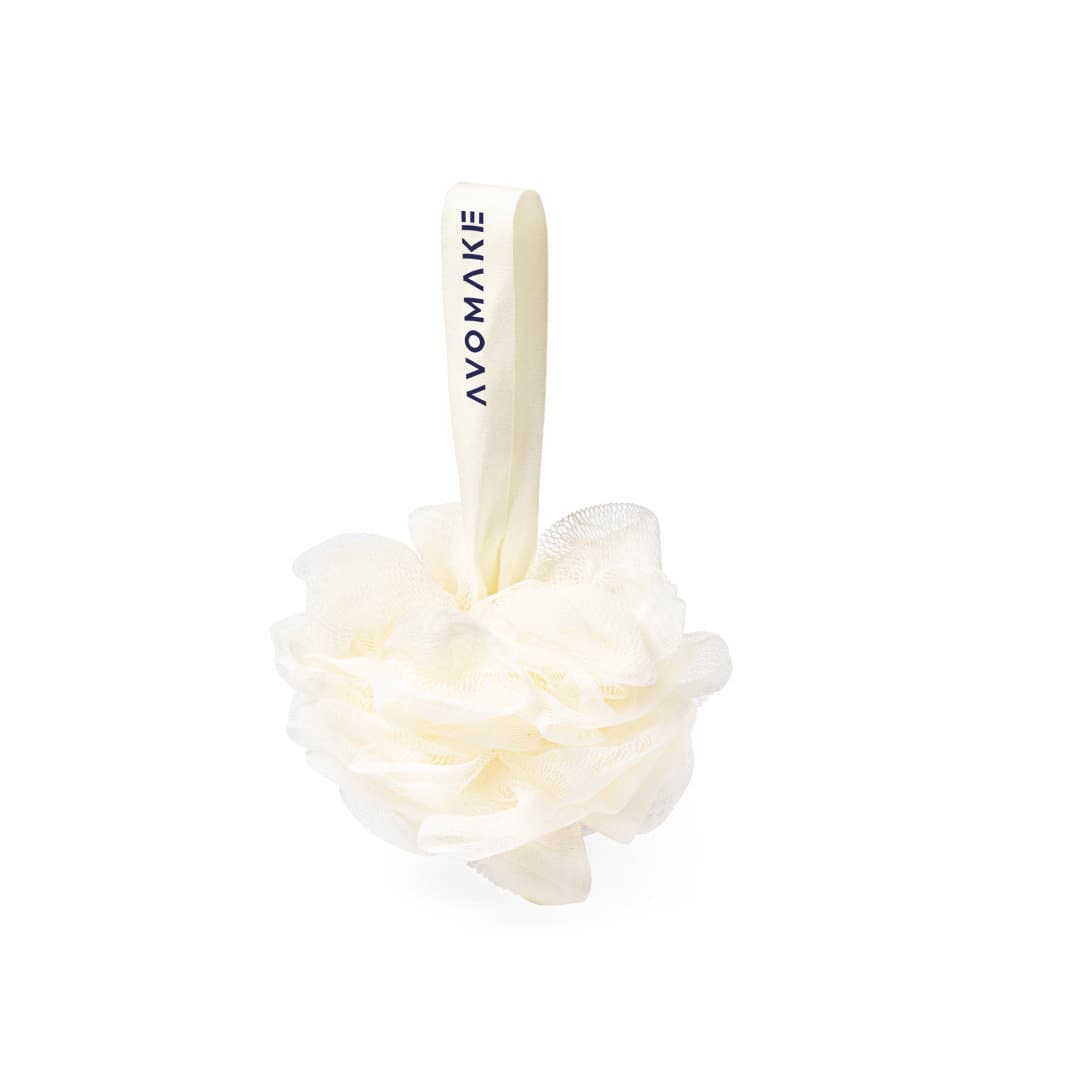 A white, fluffy bath sponge with a hanging loop, featuring a logo on the loop. Kika Sponge Bath - Image 1