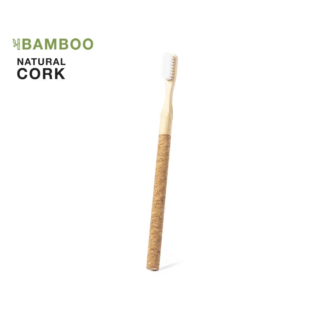 A toothbrush with a bamboo handle and natural cork grip, featuring white bristles and a simple design. Piglet Toothbrush - Image 1