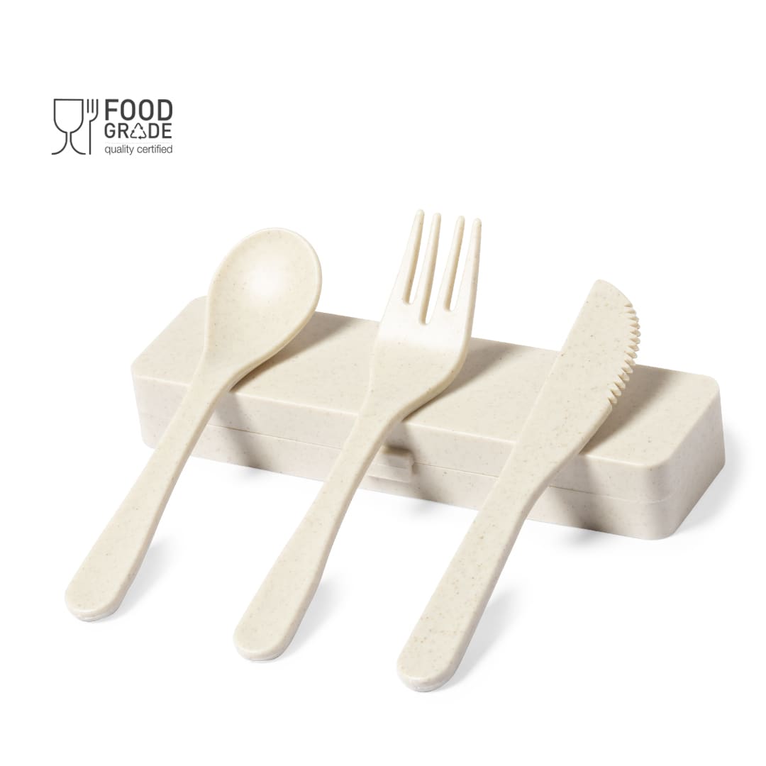 A cutlery set in beige, featuring a spoon, fork, and knife on a matching tray. Includes a branded logo. Dranel Cutlery Set - Image 1