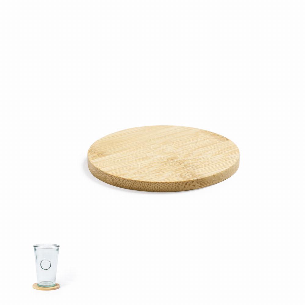 A round bamboo serving board with a smooth surface, accompanied by a clear glass cup on a bamboo coaster. Derrik - Image 1