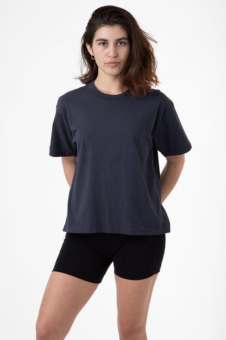 A model stands wearing a charcoal garment dye wide tee and black shorts, showcasing a relaxed fit and casual style. Garment Dye Wide Tee - Image 1