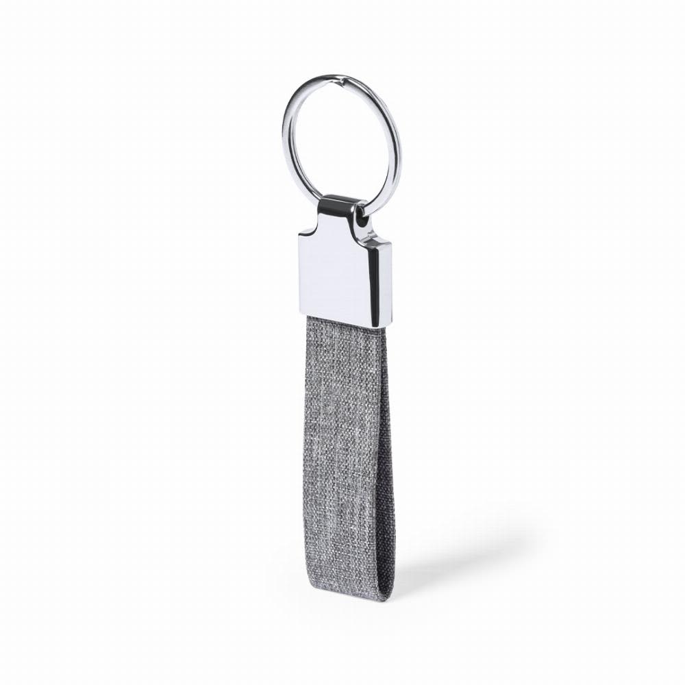 A keyring with a silver metal attachment and a grey fabric strap. The design is sleek and minimalist. Branis - Image 1