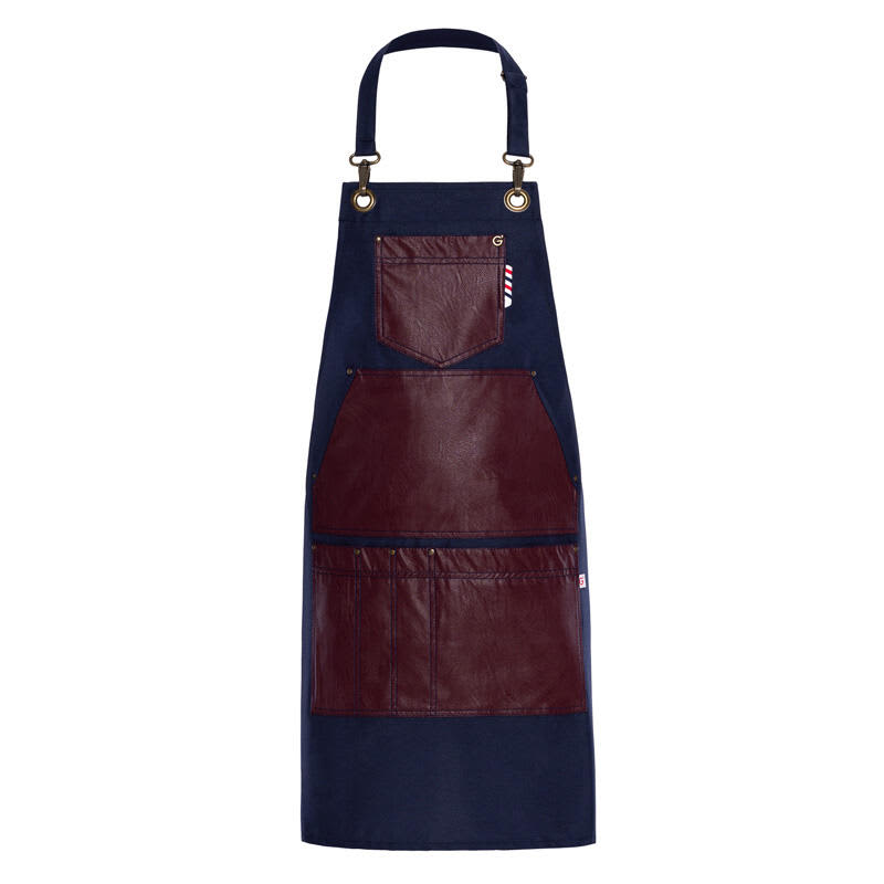 A navy apron with brown leather accents and multiple pockets, featuring a logo at the top. Gauguin Apron - Image 1