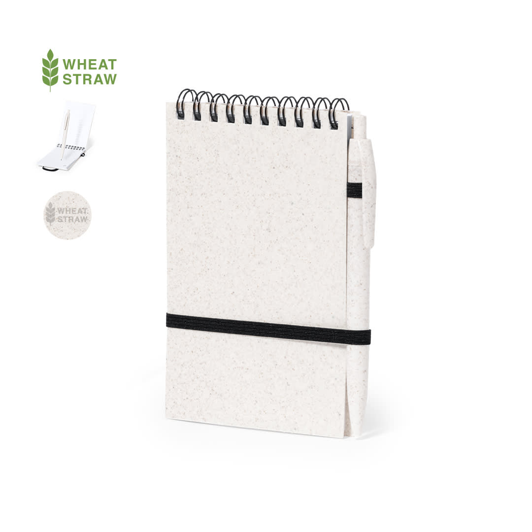 A white notebook made from wheat straw, featuring a spiral binding and a black elastic band. It has a logo. Fanny Notebook - Image 1