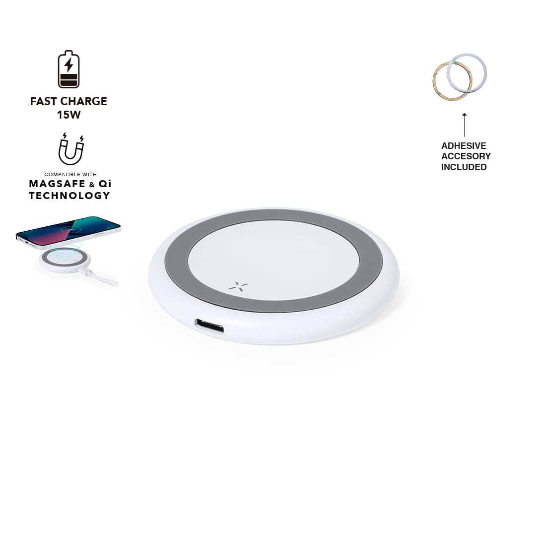 A wireless charger in white with a black circular design. Includes an adhesive accessory and is compatible with MagSafe and Qi technology. Joyce - Image 1
