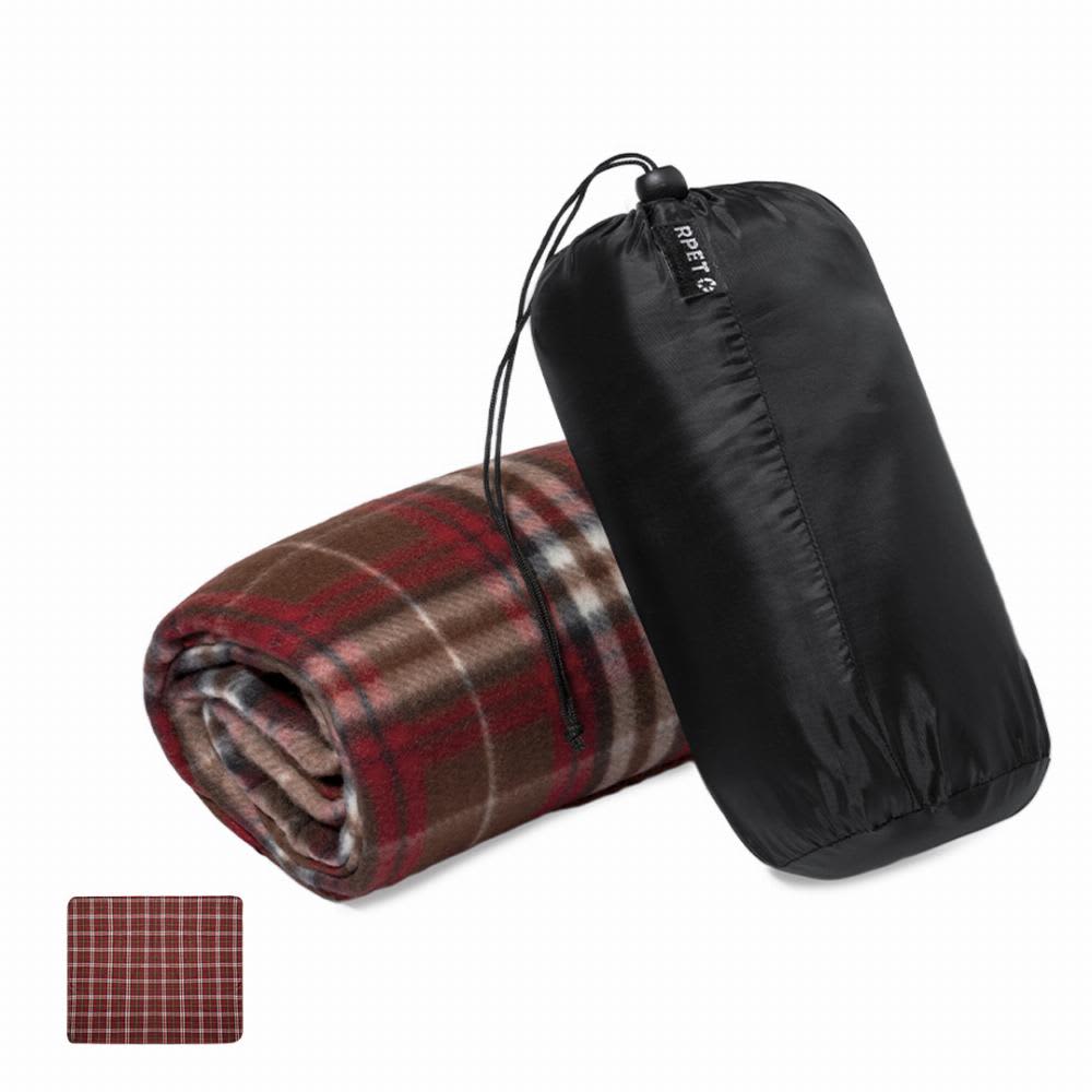 A rolled-up blanket in a black carrying pouch, featuring a red and brown plaid pattern. The blanket is partially visible. Barzagli - Image 1