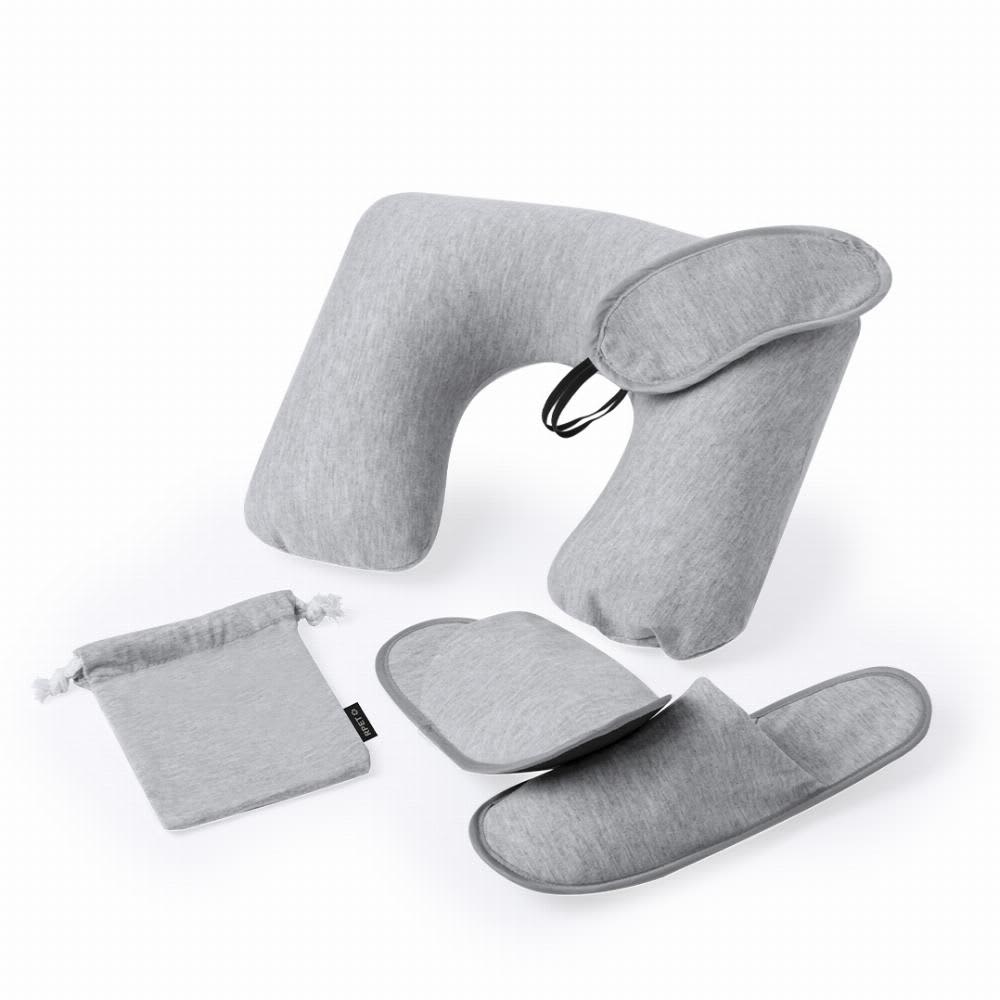 A grey travel neck pillow set, including a neck pillow, eye mask, and slippers, all in a soft fabric. Alkes - Image 1