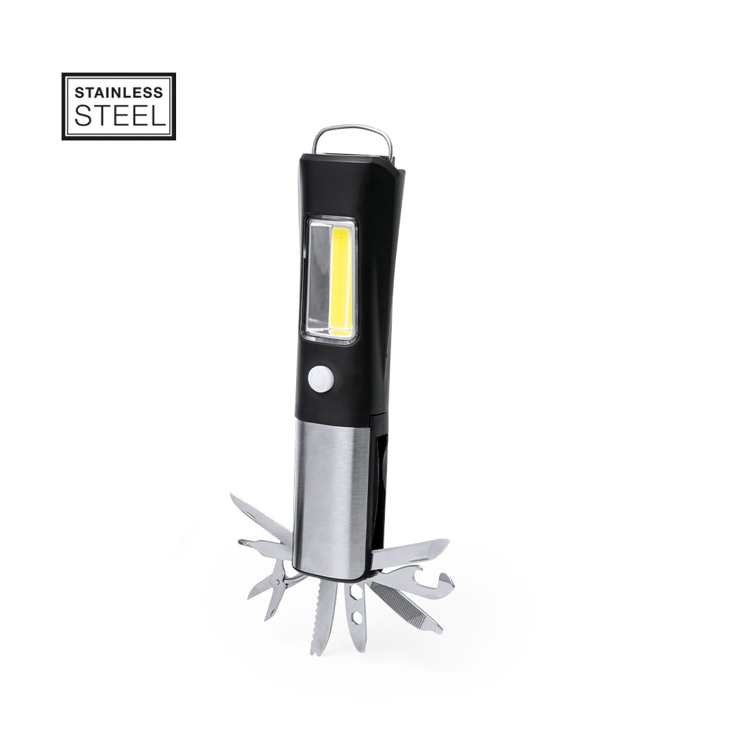 A stainless steel multi-tool with a black handle, featuring various tools including a flashlight. Layla Multitool - Image 1