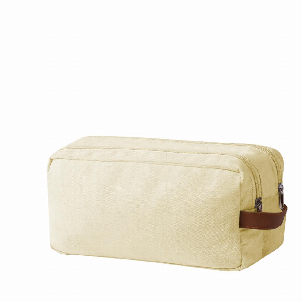 A cream-coloured toiletry bag with a zip closure and a brown handle. Features a simple, rectangular design. Raberu - Image 1