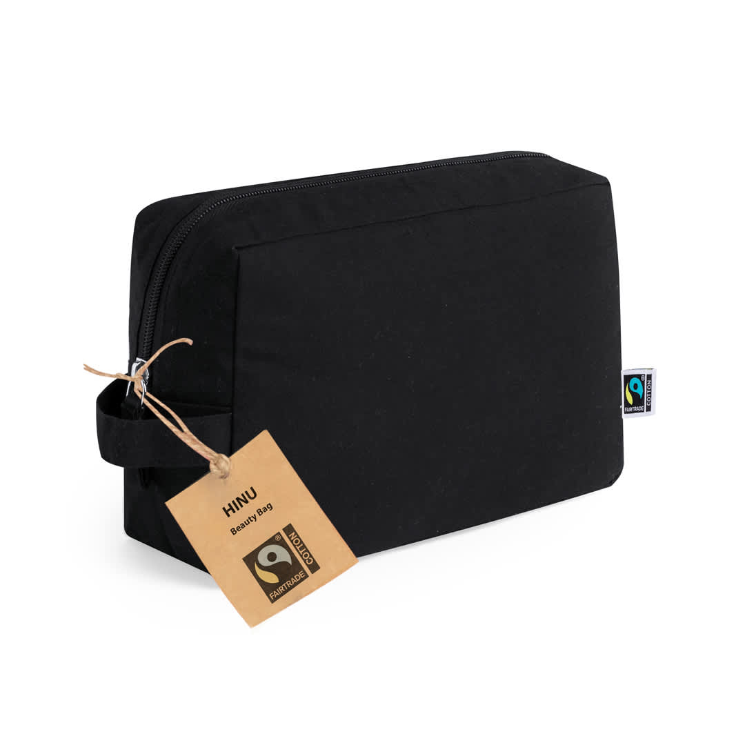 A black toiletry bag with a zipper closure and a handle, featuring a tag and a logo. Hinu Fairtrade Beauty Bag - Image 1
