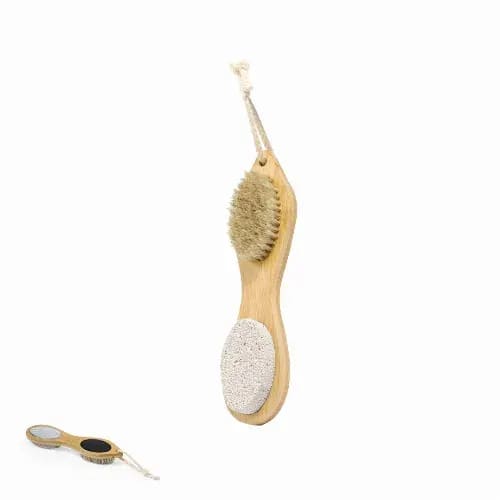 A grooming brush set featuring a wooden handle with a natural bristle brush and a pumice stone, both with ropes. Cierny - Image 1