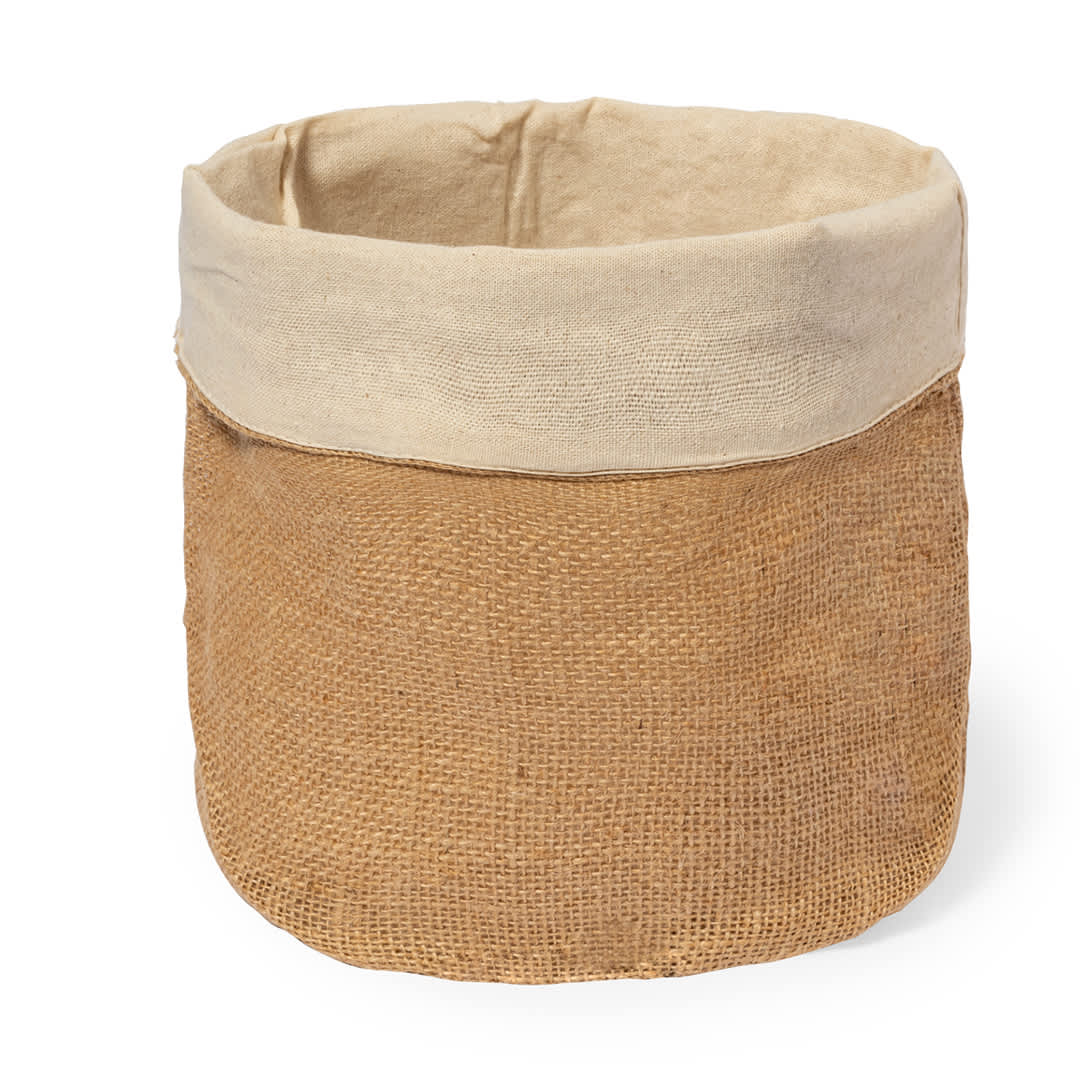 A round, natural jute bread basket with a beige fabric lining at the top. It features a rustic texture. Seloria Bread Basket - Image 1