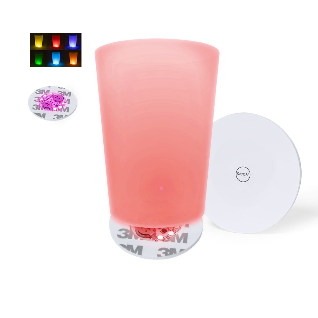 A pink drink bottle with a white coaster featuring a logo. The image includes colourful lights in the background. Stanfor Coaster - Image 1