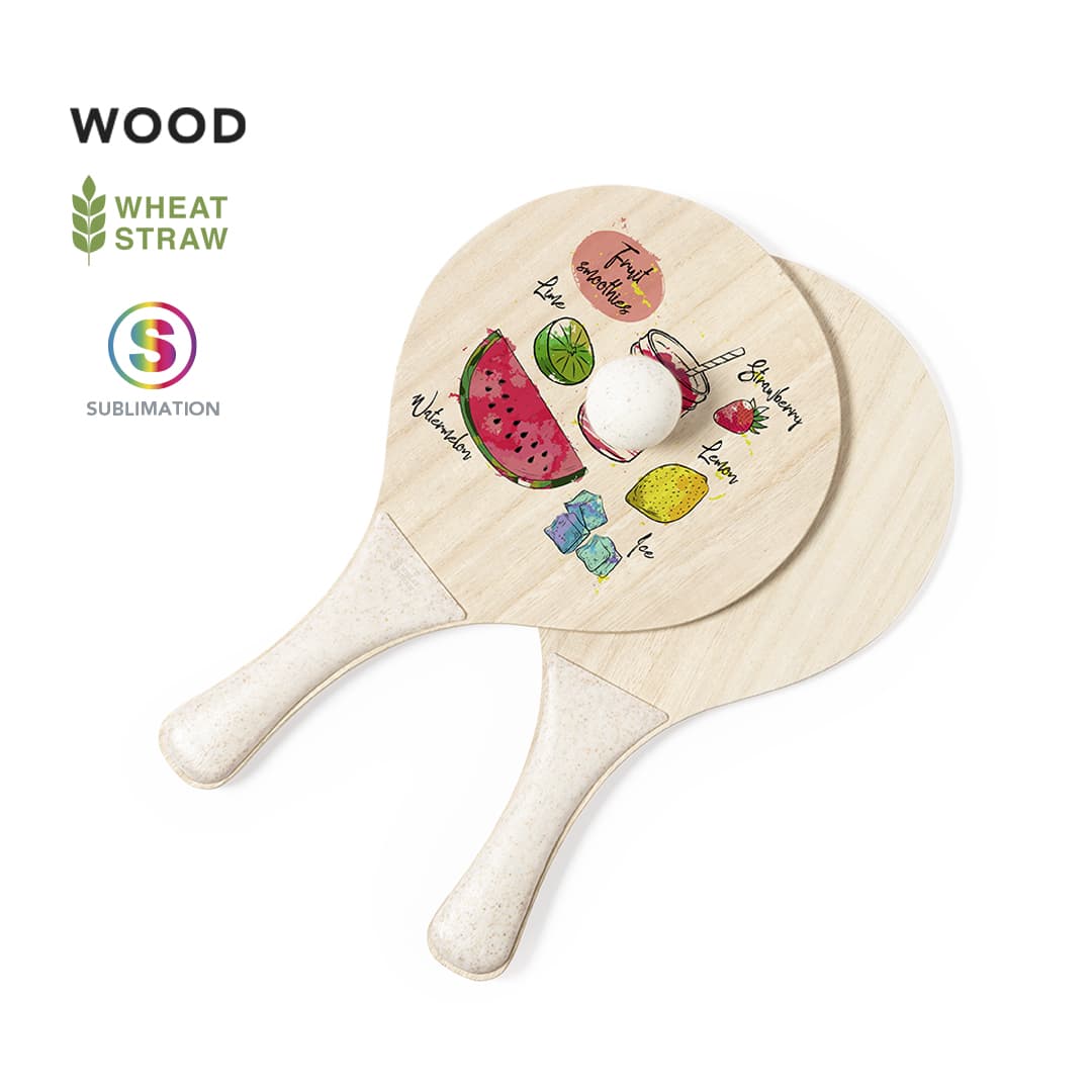 Two wooden beach rackets in light colour featuring vibrant, colourful fruit illustrations. Each racket has a smooth handle. Zaxia Sublimation Beach Rackets - Image 1