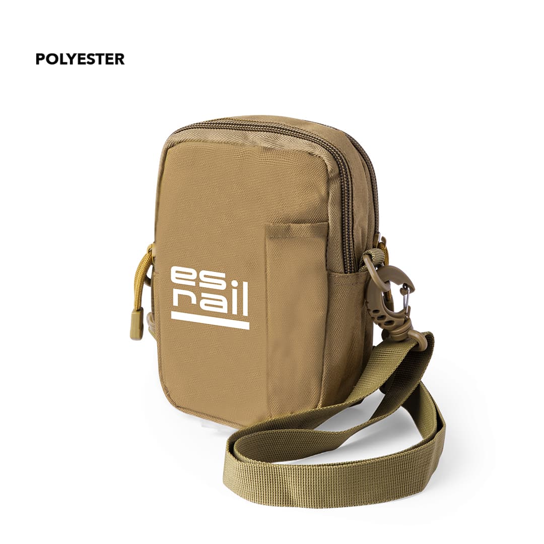 A tan shoulder bag with a zippered closure, an adjustable strap, and a logo. Made of polyester. Gertler Shoulder Bag - Image 1