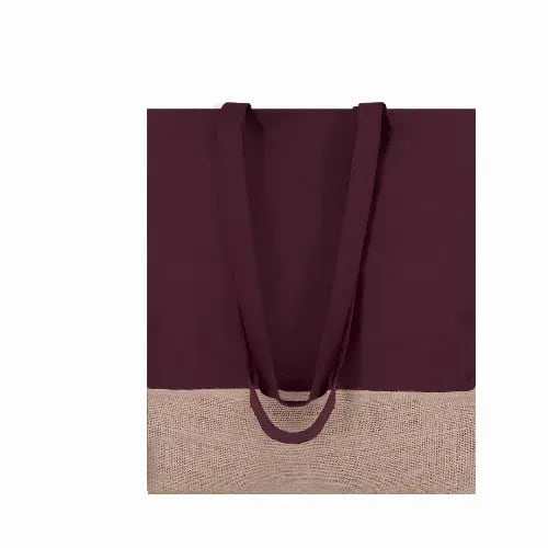 A tote bag featuring a burgundy fabric upper and a natural jute lower section, with long handles. Suelva - Image 1