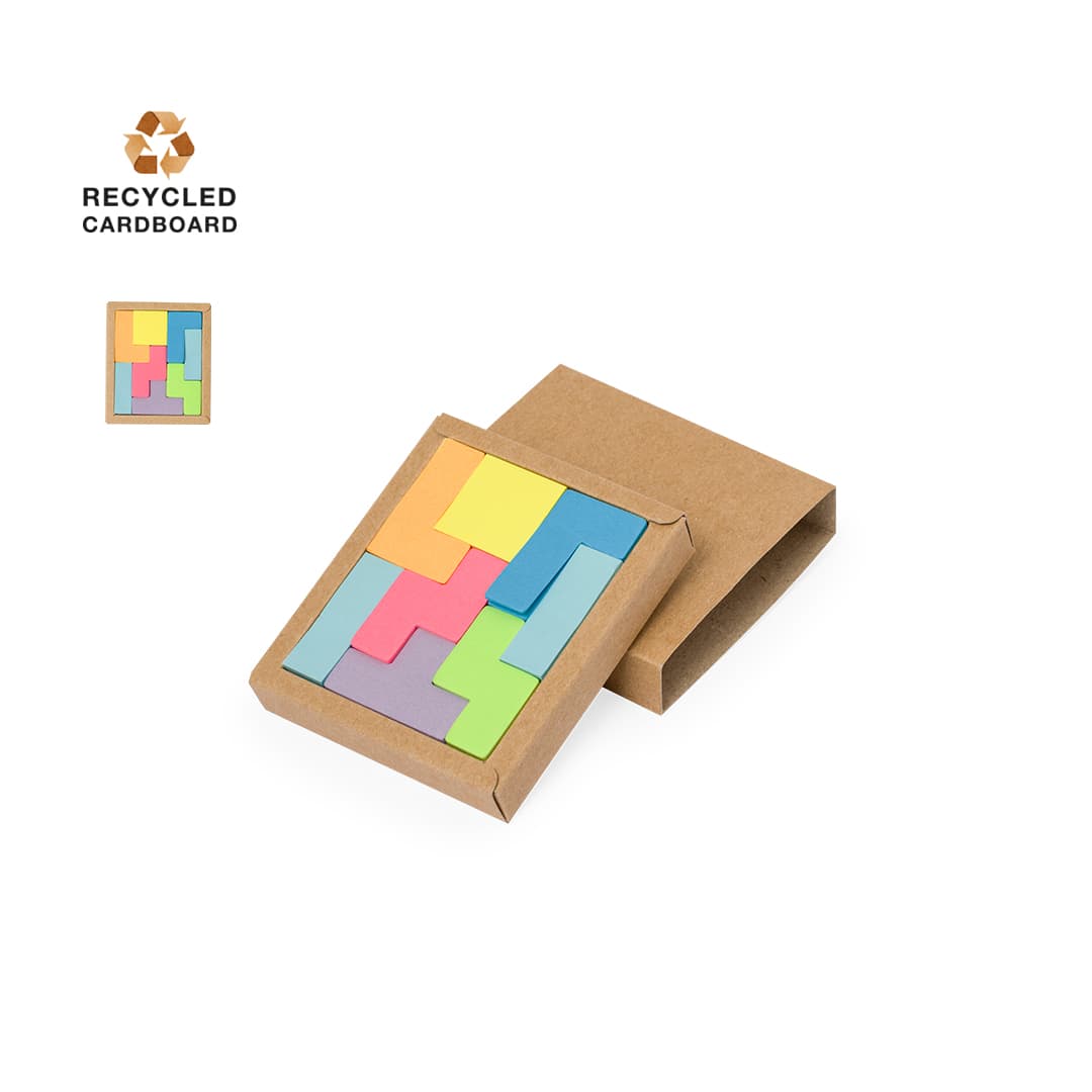 A notepad pack in a brown cardboard box, featuring colourful sticky note shapes in pastel shades. Kuaid Notepad - Image 1