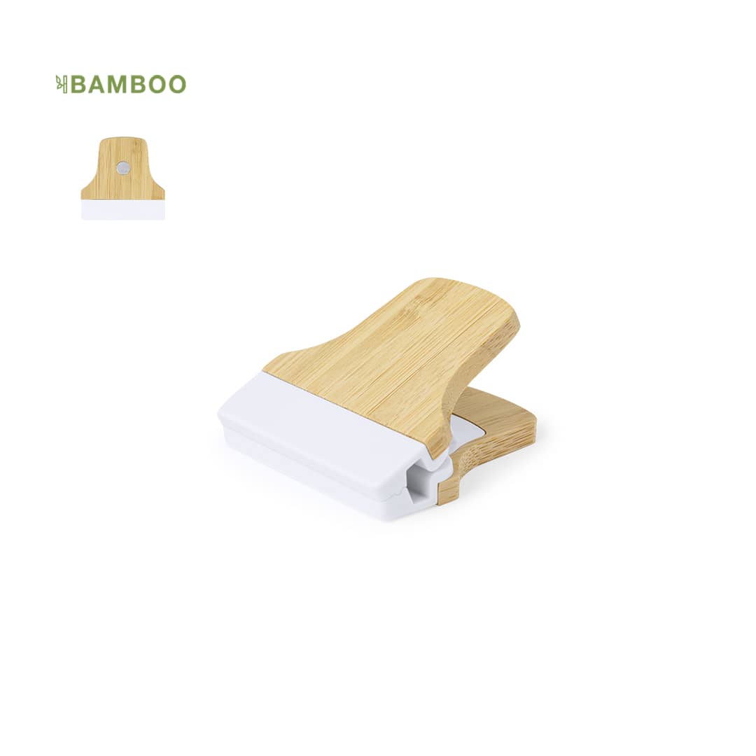 A bamboo and white clip with a unique design, featuring a round hole for easy attachment. Sediax Clip - Image 1