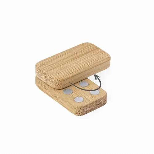 A bamboo product featuring two pieces with a magnetic closure and four silver discs on the top piece. Bover - Image 1