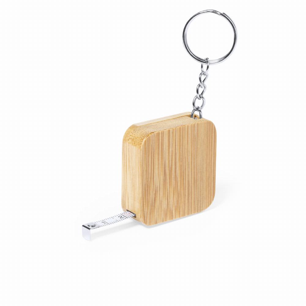 A tape measure keychain is made of bamboo, featuring a silver measuring tape that extends from the wooden case. Axler 1m - Image 1
