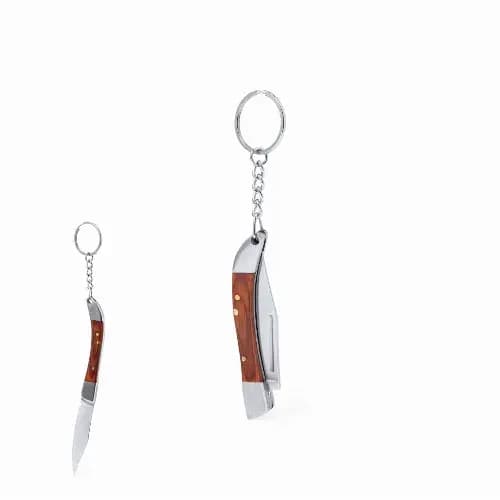 A keychain featuring a silver-coloured knife design with a wooden handle. It has a metal ring for attachment. Spiet - Image 1