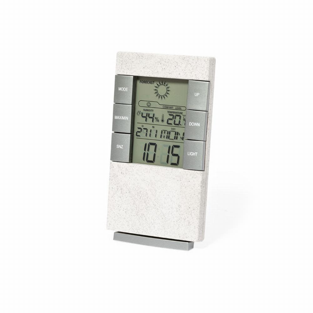 A digital weather station in a light grey and silver design, displaying temperature, humidity, and time. Maginly - Image 1