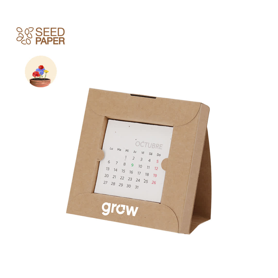 A brown cardboard desk calendar with a stand, featuring a date grid for October and a logo. Krily Seeds Desktop Calendar - Image 1