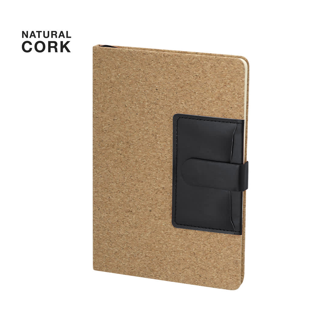 A cork-covered notepad with a black elastic band closure and a pocket for notes or cards. Rosiuk Notepad - Image 1