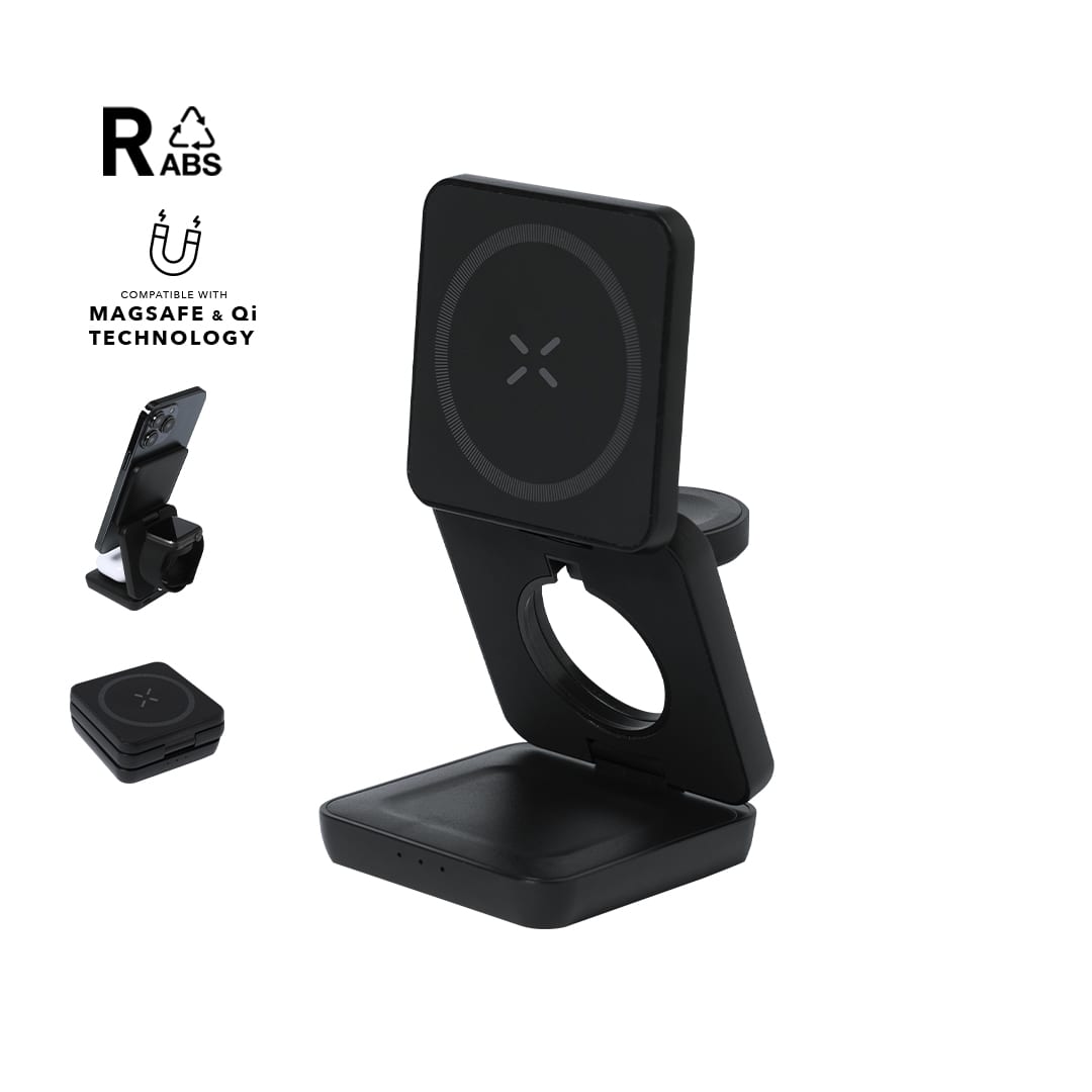 A wireless charger in black, designed to hold a phone upright, with a sleek, foldable design and branding. Komal Charger - Image 1