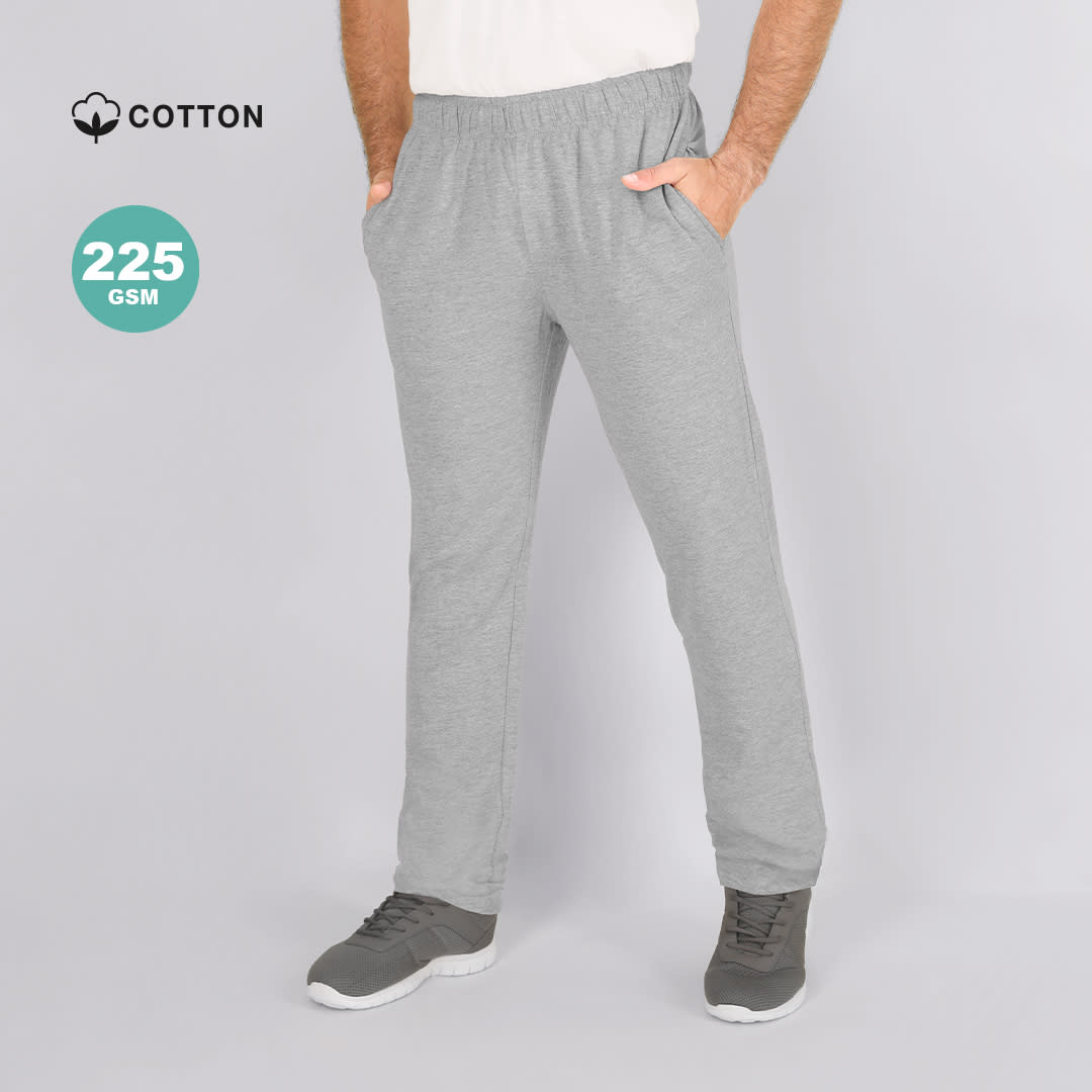 Grey Kiana Joggers made from 225 GSM cotton, featuring an elastic waistband and side pockets. Includes a logo. Kiana Joggers - Image 1