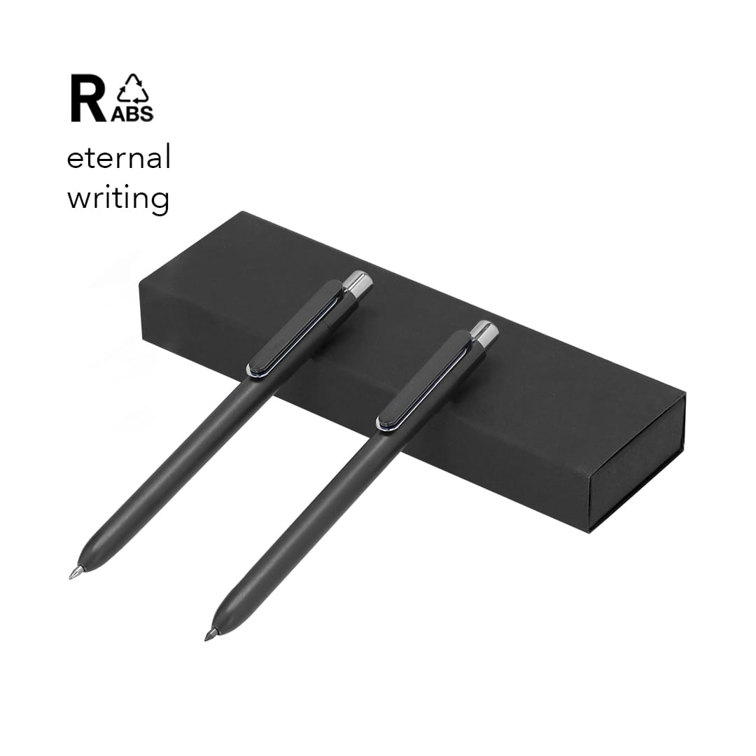 A set of two black pens situated on a black box, featuring a sleek design and a branding logo. Dayal Set - Image 1