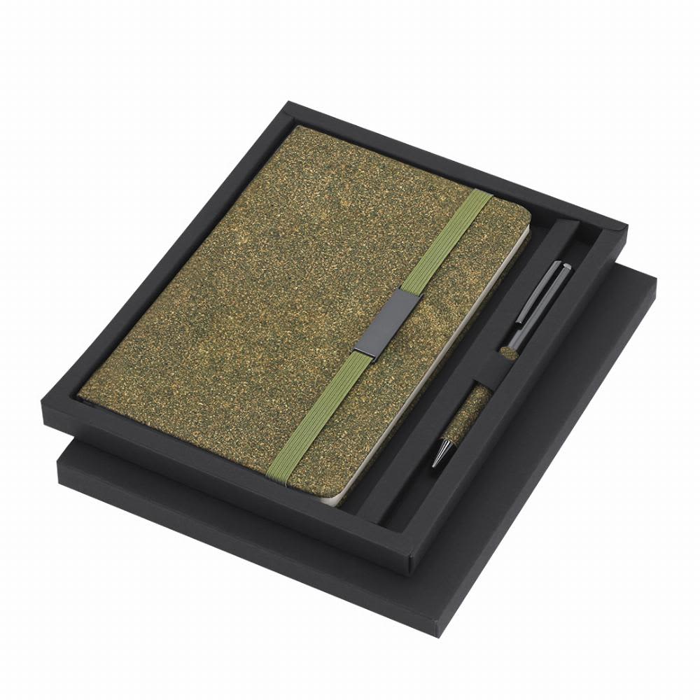 A gift set featuring a green textured notebook and pen, presented in a sleek black box. Malcon - Image 1