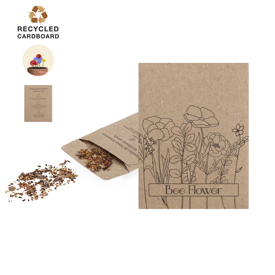 A seed packet made of brown recycled cardboard, featuring illustrations of flowers and a small pile of seeds. Balvor Seeds Packet - Image 1
