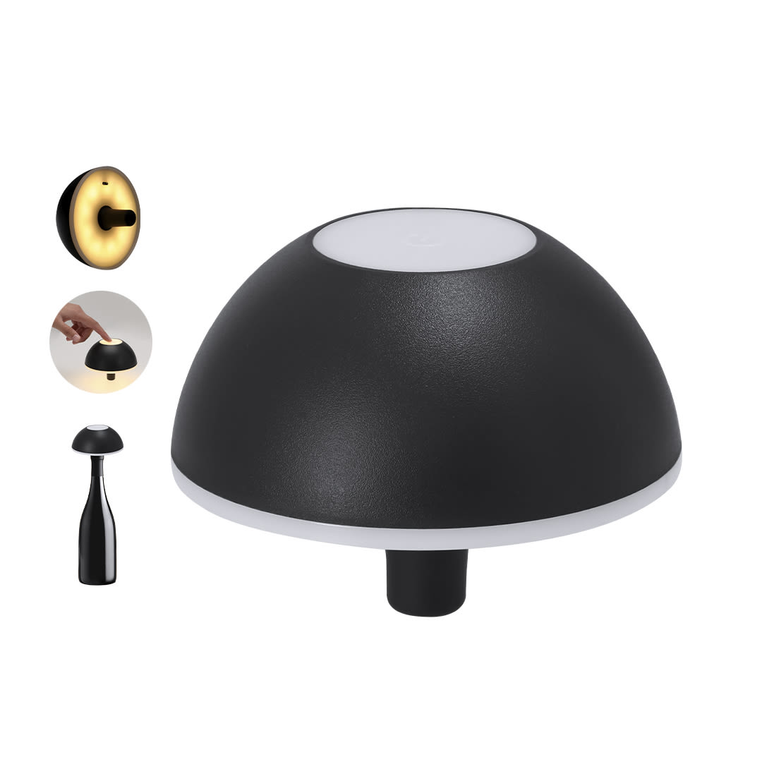 A black dome-shaped lamp with a white light top and a small base, featuring a logo on the side. Kalvan Lamp - Image 1