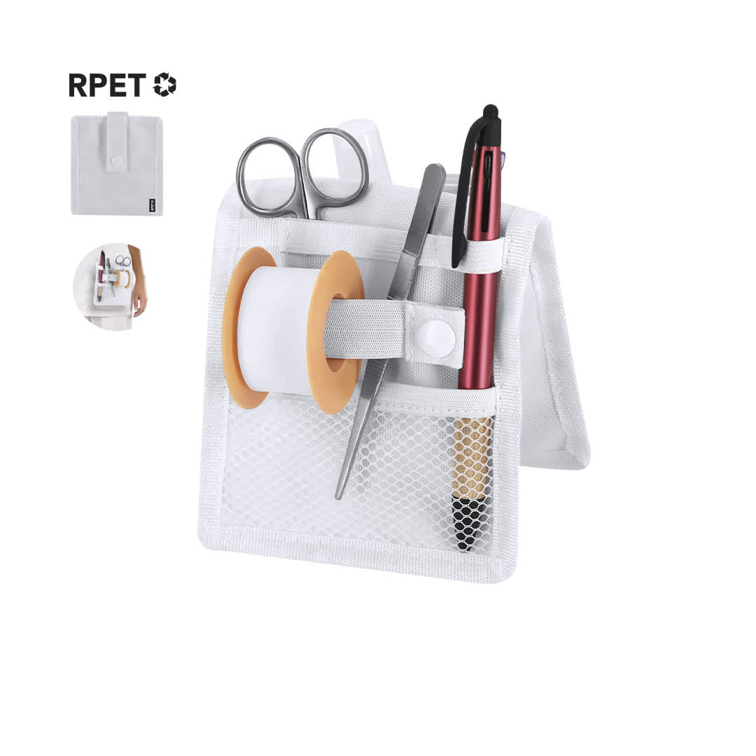 A white nursing organiser with pockets for scissors, pens, tweezers, and tape. Features a logo but no visible text. Kocis Nursing Organizer - Image 1