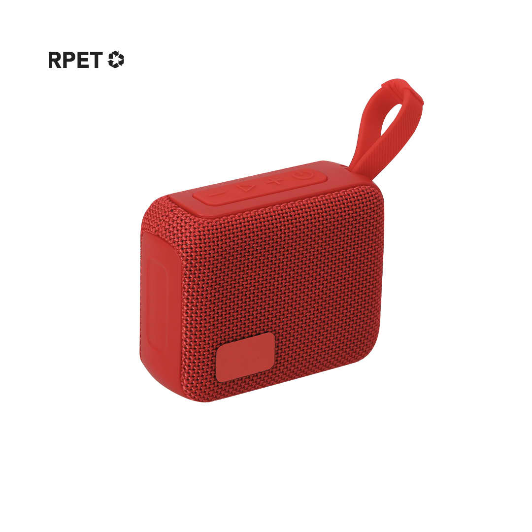 A red portable speaker with a textured surface, featuring a small handle and a logo. Groxen Speaker - Image 1