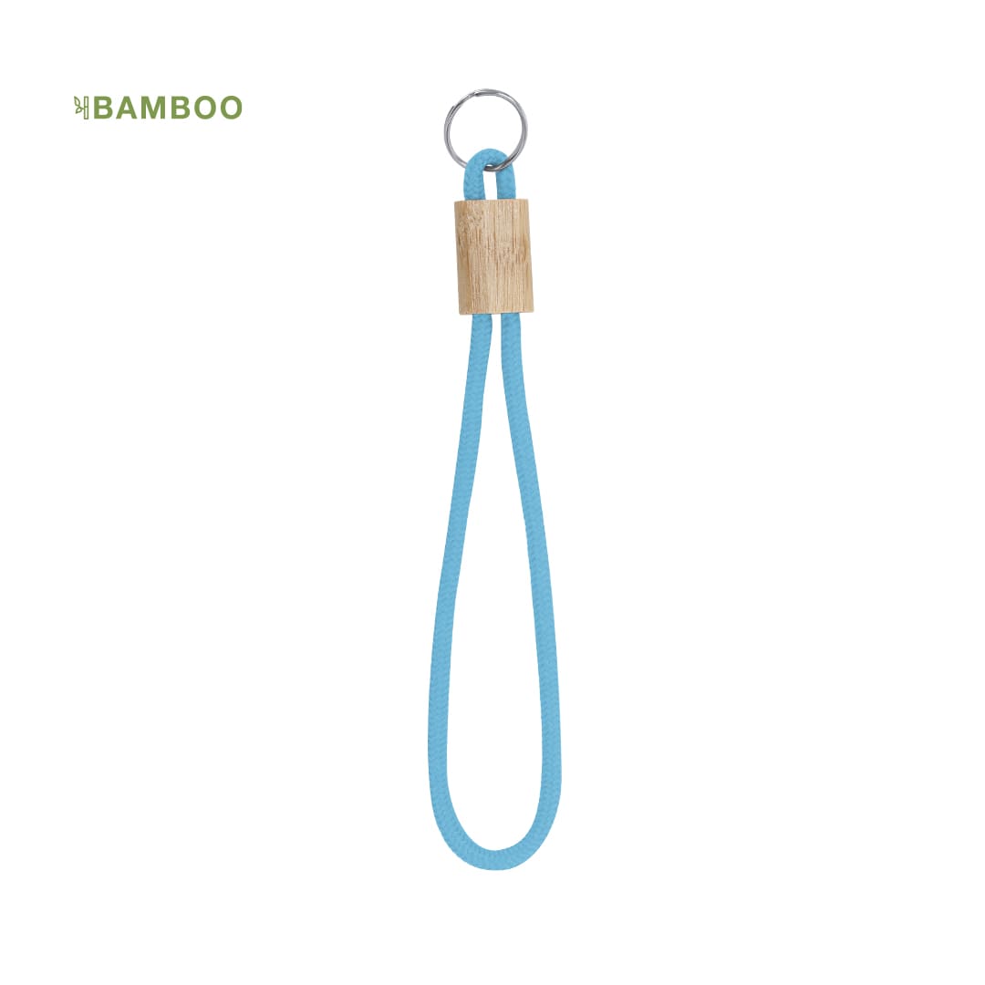 A turquoise keyring featuring a bamboo accent and a metal ring for attachment. Walnut Keyring - Image 1