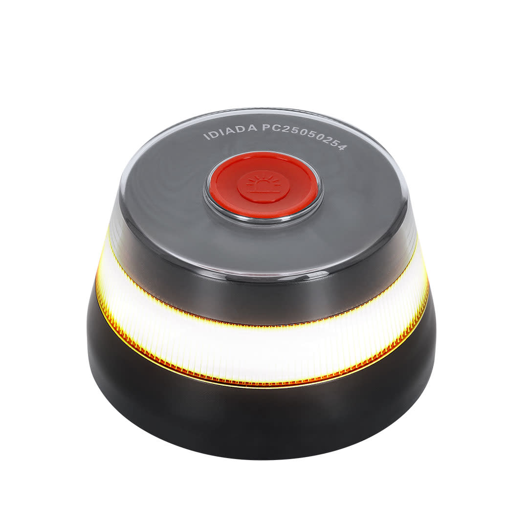 A geolocated emergency light in grey and red, featuring a circular design with a bright white and yellow light band. Pylon Geolocated Emergency Light V16 - Image 1