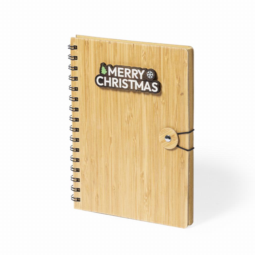 A bamboo notebook with a spiral binding and a festive "Merry Christmas" logo on the cover. Mossel - Image 1