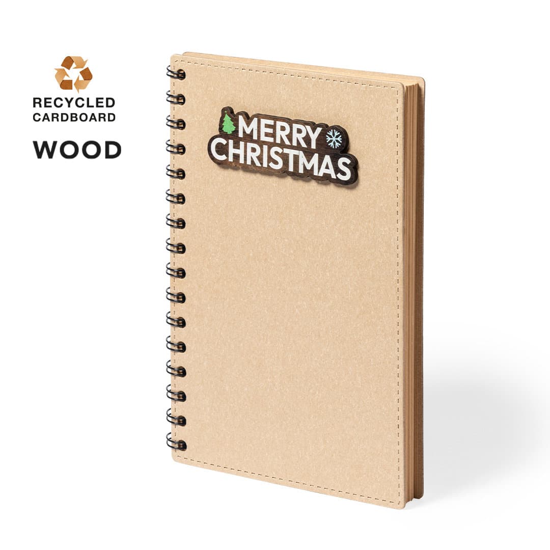 A tan spiral notebook made from recycled cardboard, featuring a decorative "Merry Christmas" design. Noylax Notebook - Image 1