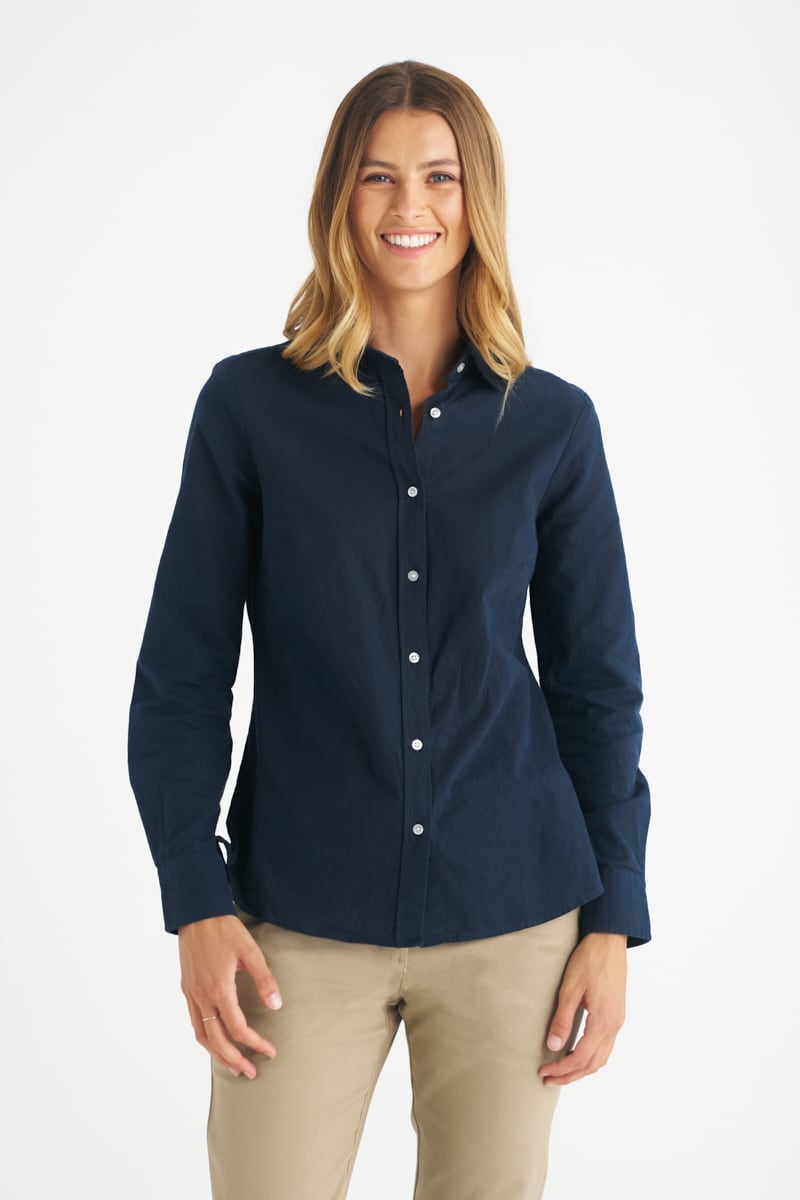 A navy blue long sleeve ladies button-up shirt with a collar and a logo. Floyd - Ladies Long Sleeve Shirt - Image 1