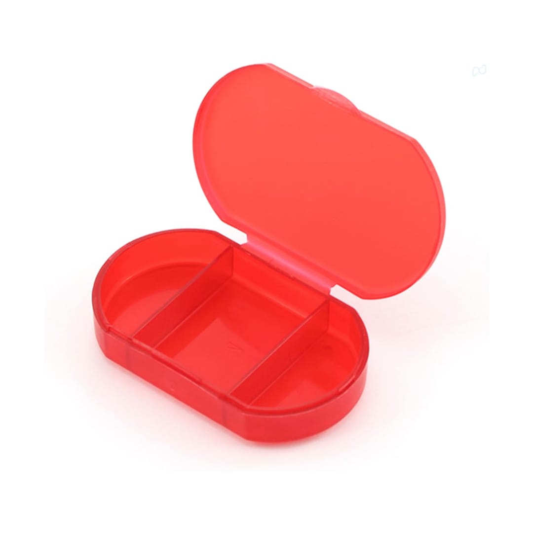 A red Trizone Pillbox with three compartments, featuring a hinge for opening and closing. It has a smooth, glossy finish. Trizone Pillbox - Image 1