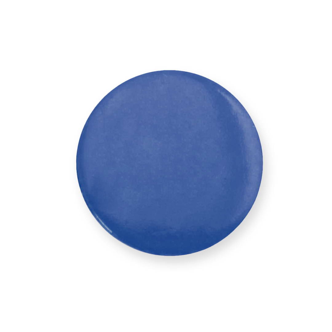 A circular lapel pin in a solid blue colour with a glossy finish and a branding logo. Turmi Pin - Image 1