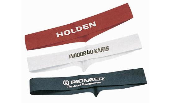Three fitted hat bands in red, white, and navy, each featuring different logos and branding. Fitted Hat Band - Image 1