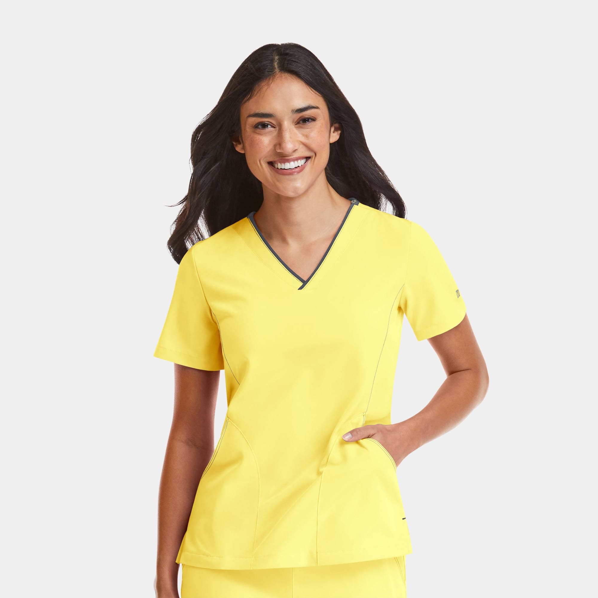 A women’s v-neck top in vibrant yellow with contrast detailing and a subtle logo. Matrix Impulse Womens Contrast V-Neck Top - Image 1